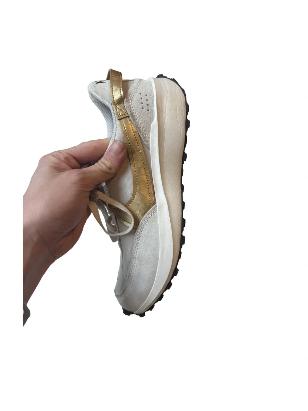 Nike Waffle Debut sneakers in a light orewood brown and metallic gold colorway